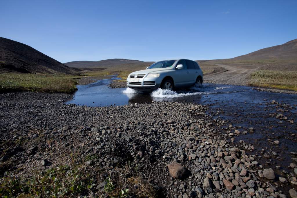 Crossing a small mountain river on a jeep-track with Emil at the steering wheel