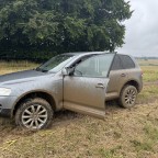 Abgeerntetes Maisfeld im Regen