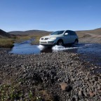 Crossing a small mountain river on a jeep-track with Emil at the steering wheel